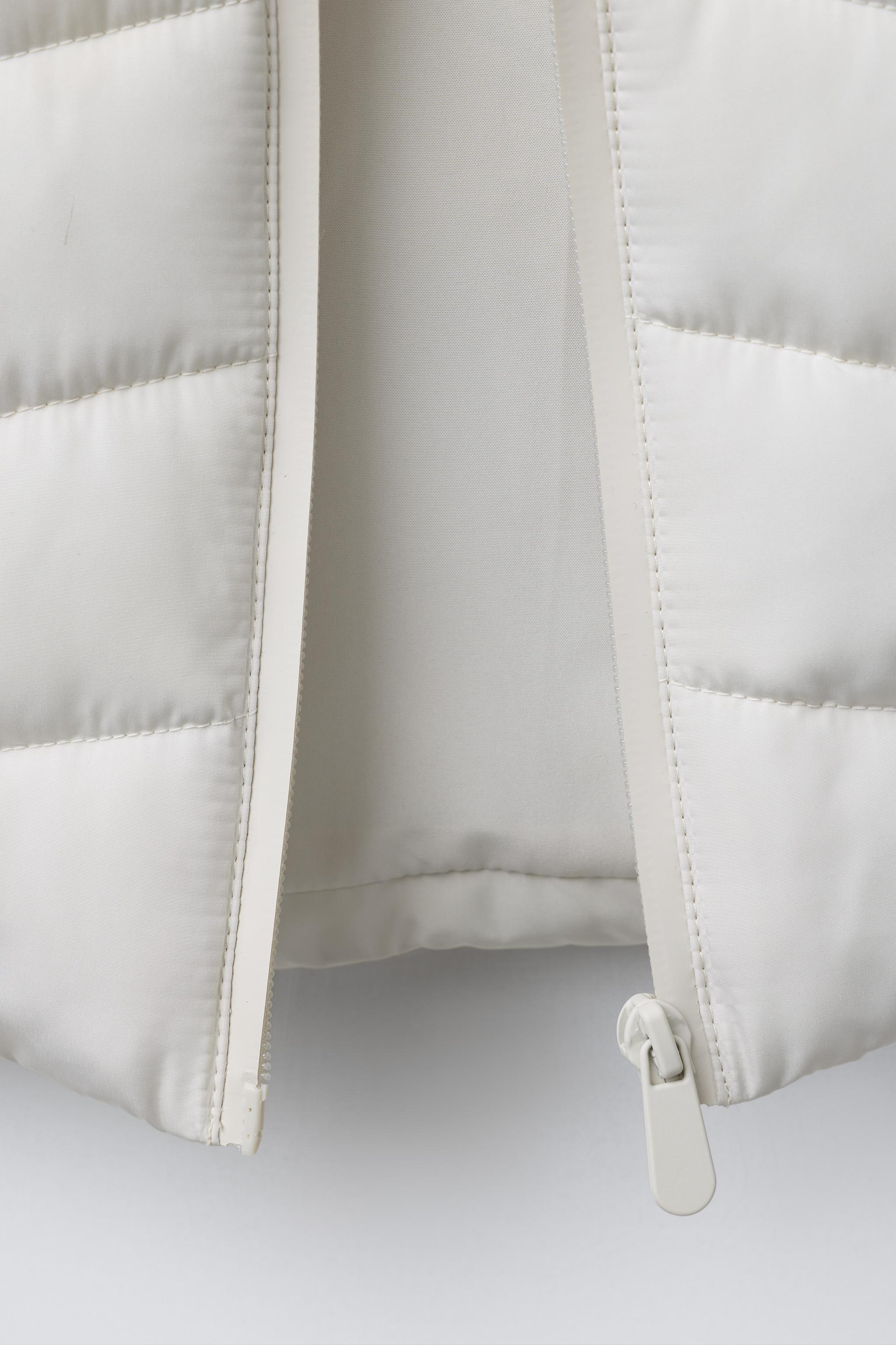 PUFFER JACKET WITH NEOPRENE EFFECT SLEEVES